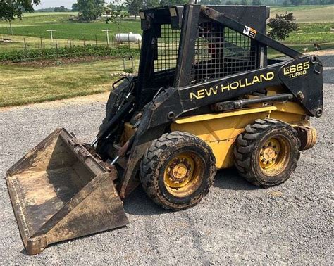 new holland skid steer 665 spec super boom|new holland skid steer pricing.